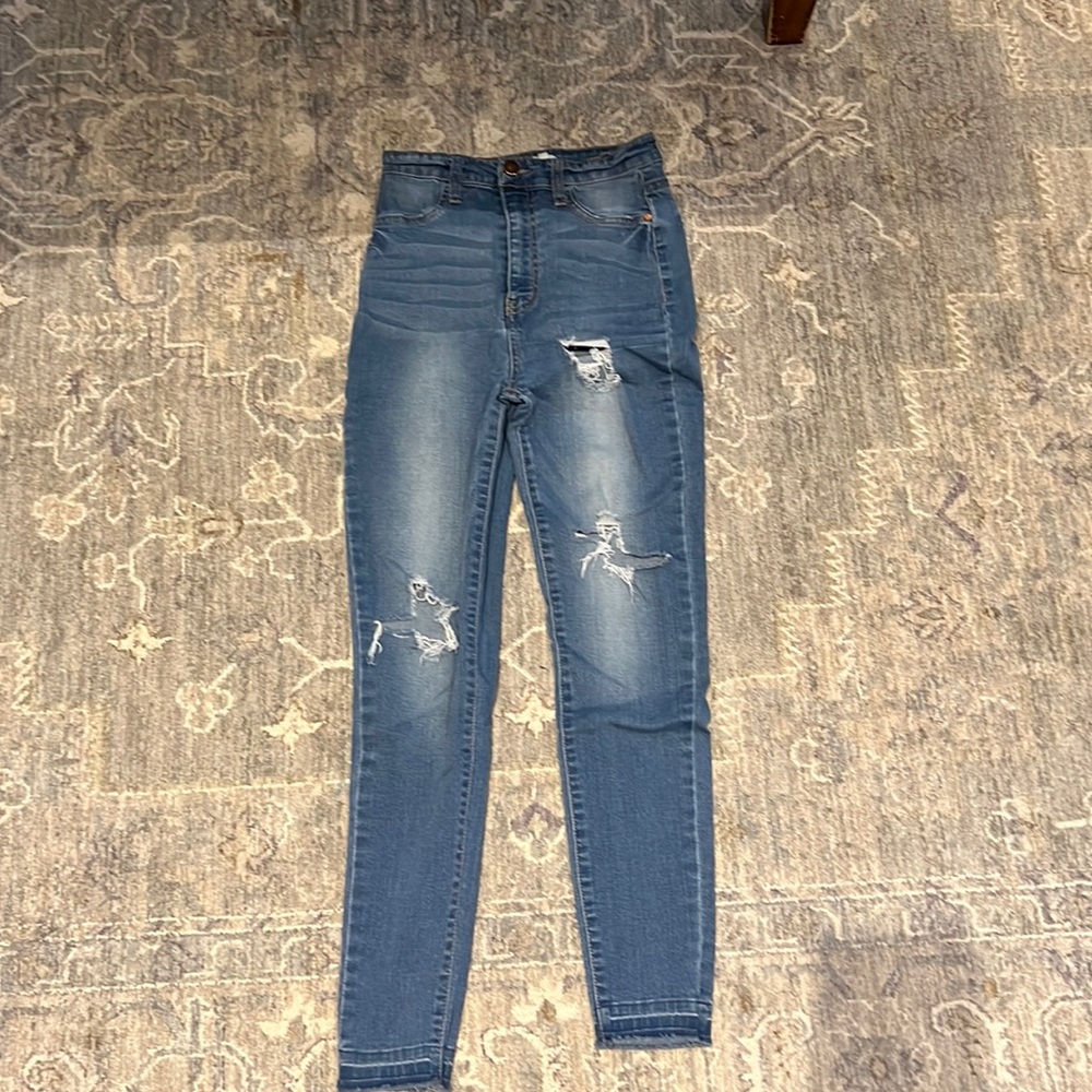 blue ripped jeans